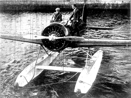 Col. Lindbergh, accompanied by Mr. D. Quinlan, the representative of Messrs. Pratts, being towed in his seaplane out of Galway docks.